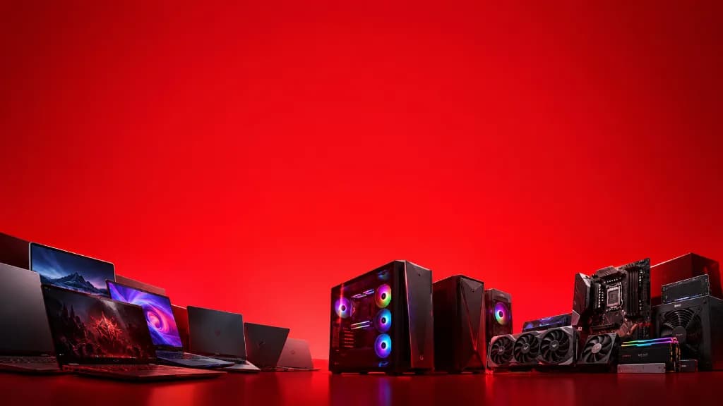 Laptops, a gaming PC and PC parts on a red background